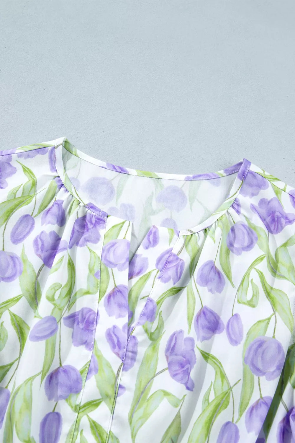 Tiered floral print midi dress with flutter sleeves and contrast trim