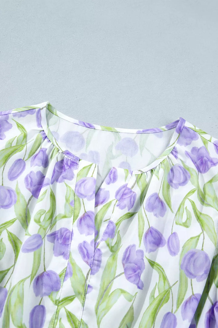 Tiered floral print midi dress with flutter sleeves and contrast trim