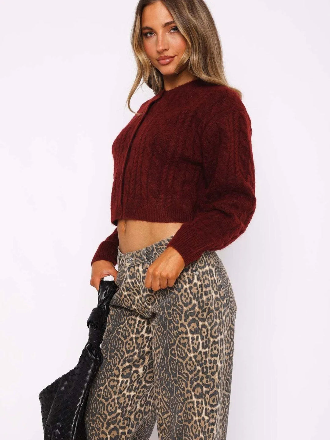 Cropped cable knit button-up cardigan with ribbed cuffs