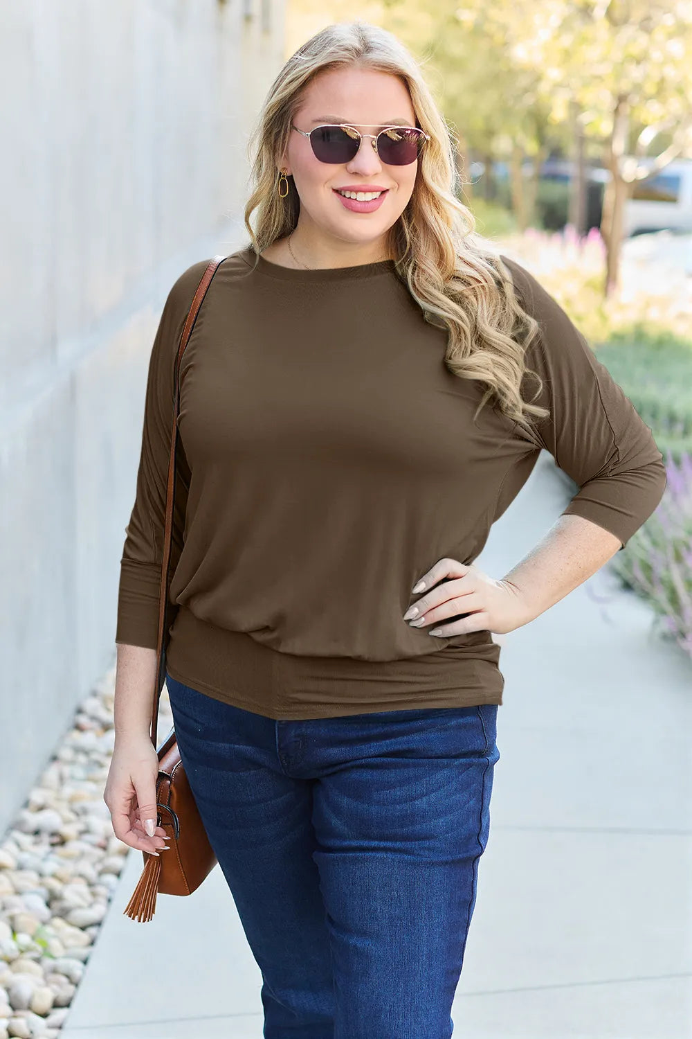 Batwing sleeve top with banded blouson hem