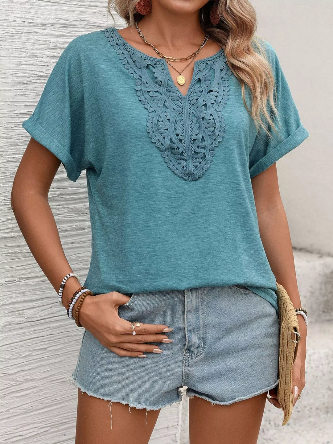 Lace-trim V-neck short sleeve top with rolled cuffs