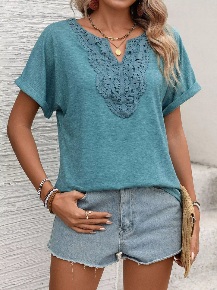 Lace-trim V-neck short sleeve top with rolled cuffs