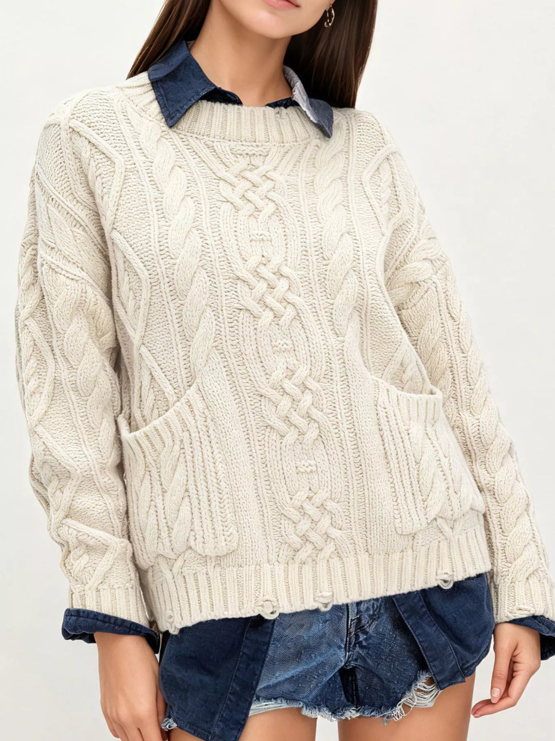 Ivory Cable knit sweater with patch pockets and raw hem