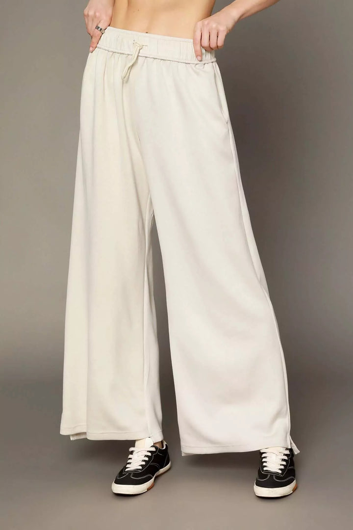 ECRU Drawstring wide-leg pants with side slits and pockets