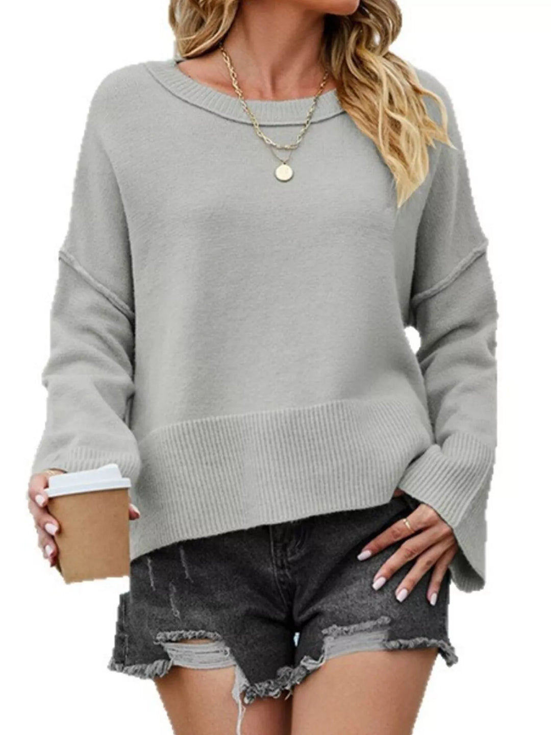 Dropped shoulder flare sleeve sweater with ribbed hem and side slits