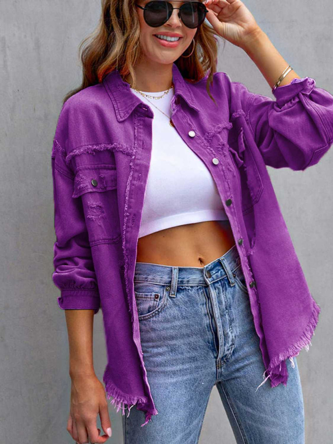 Distressed drop shoulder denim jacket with fringe hem