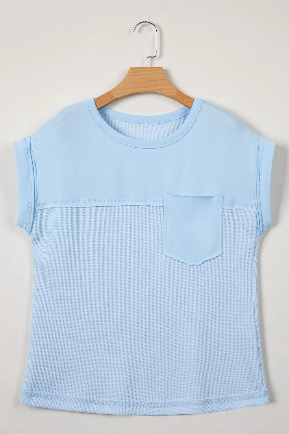 Waffle knit pocket tee with cuffed short sleeves