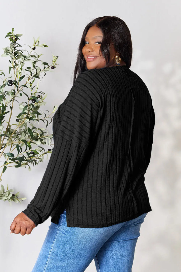 Ribbed knit round neck tunic top with side slits