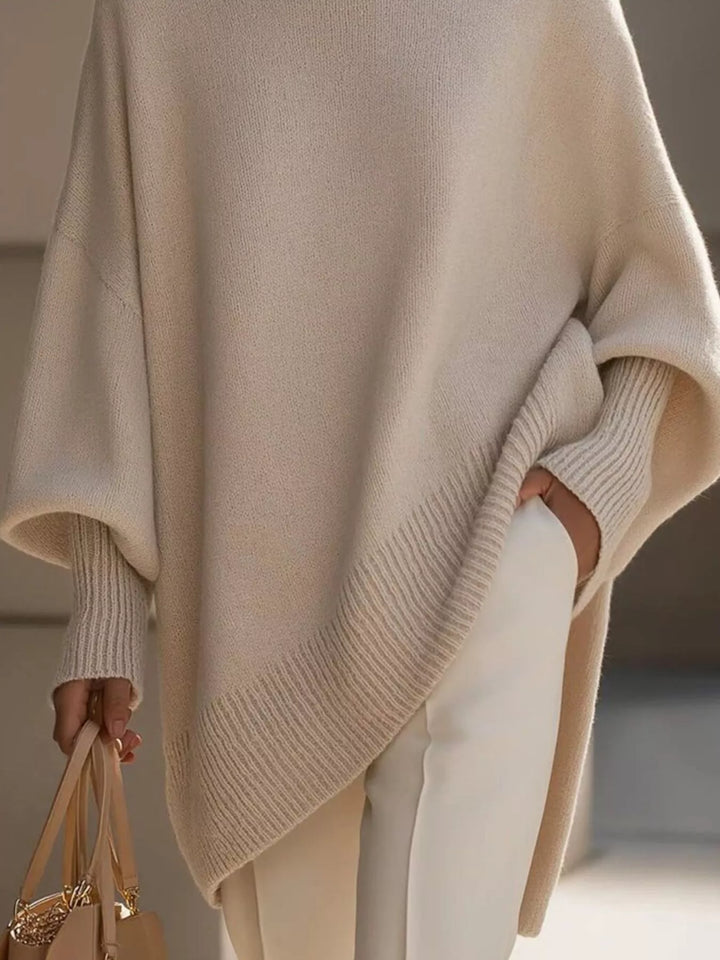 Batwing sleeve oversized sweater with asymmetric hem
