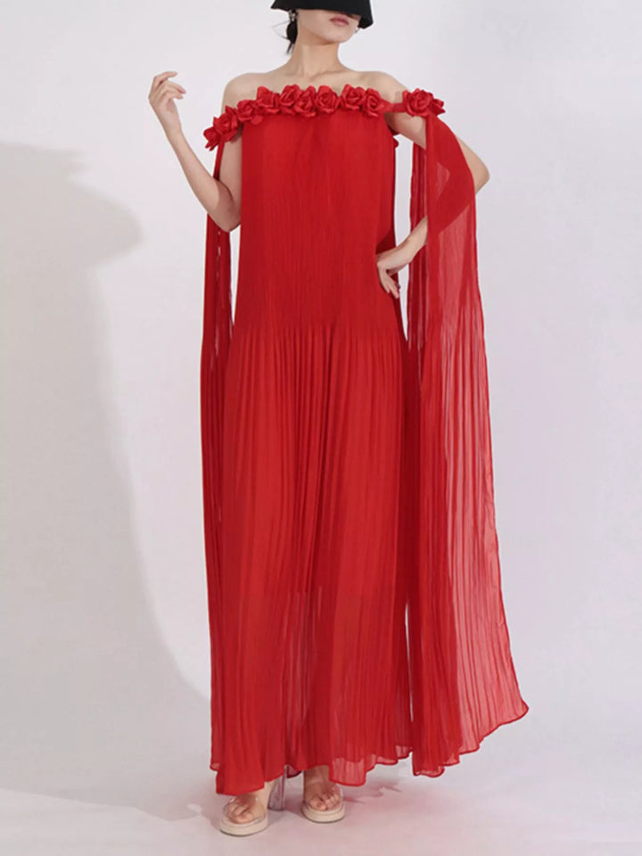 Off-shoulder pleated maxi dress with rosette neckline