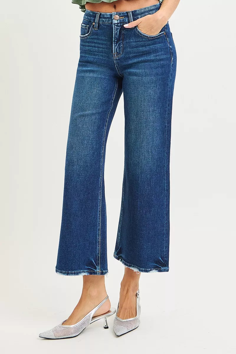 High-rise cropped wide leg jeans with raw frayed hem