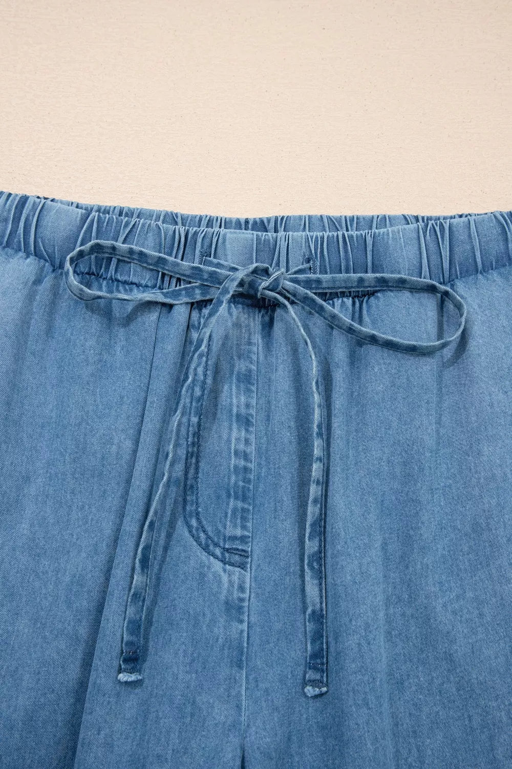 Wide-leg chambray pants with drawstring waist and ruffle hem