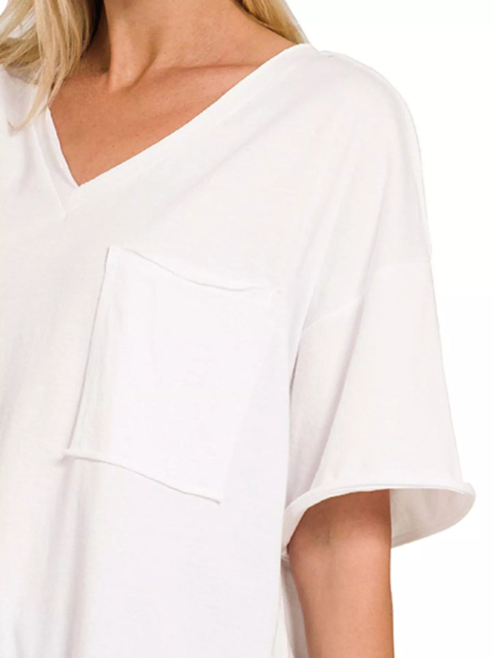 Raw edge boyfriend tee with front pocket and high-low hem