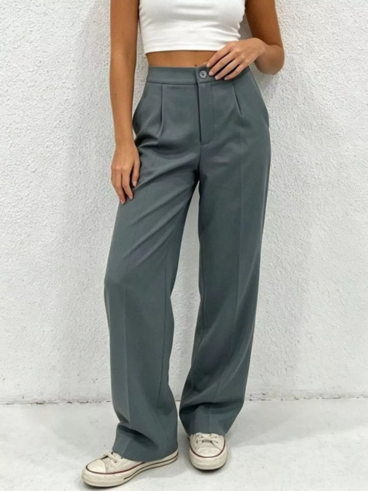 High-rise pleated wide-leg trousers with side pockets