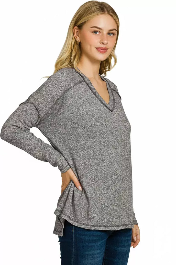 Exposed seam hacci knit V-neck top with hi-low hem