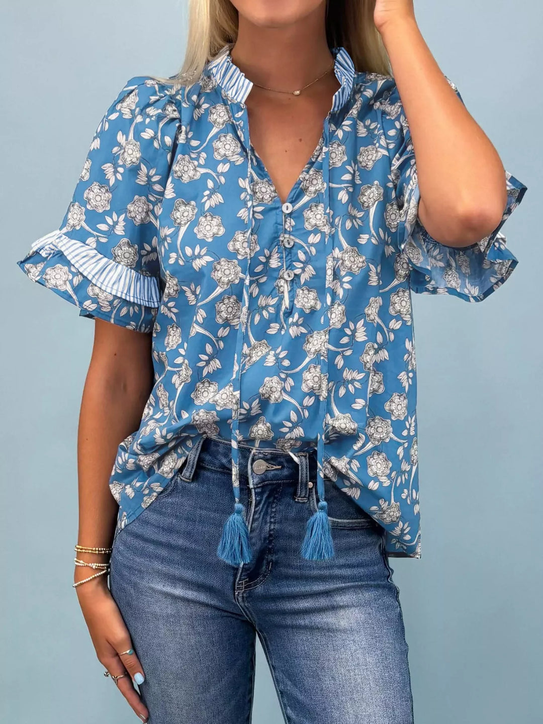 Floral print blouse with ruffle sleeves and split neck tie
