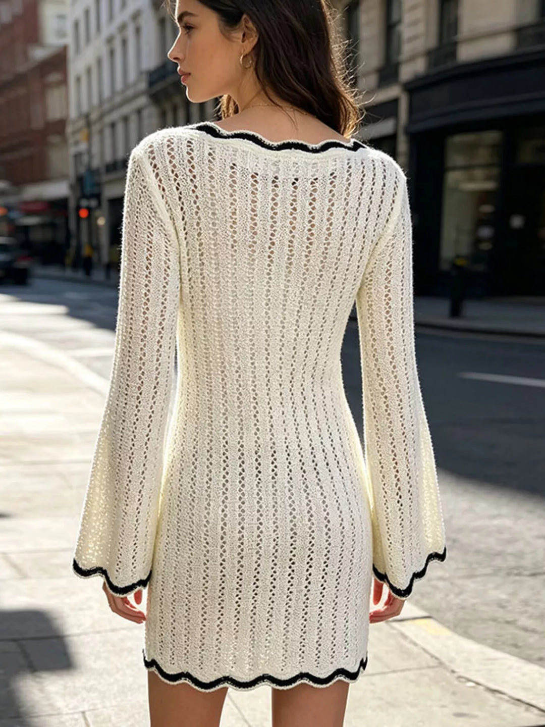 Contrast trim pointelle knit bell sleeve mini sweater dress