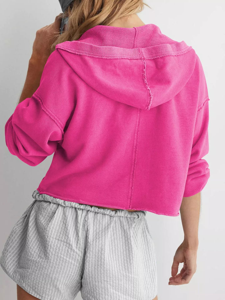 Cropped exposed-seam pullover hoodie with split neck
