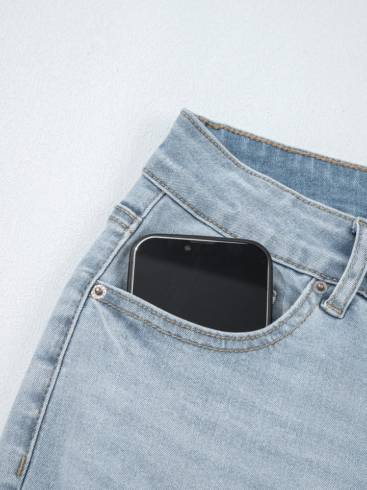 Distressed mid-rise ankle skinny jeans with raw hem