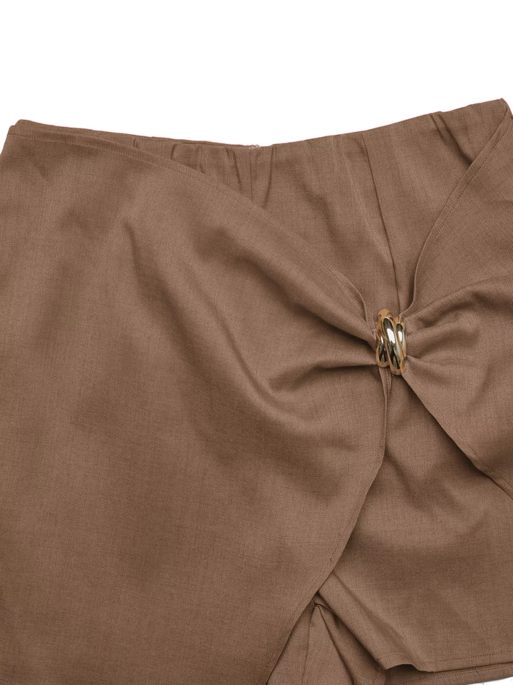 Twist-front high-rise mini skort with gold ring detail