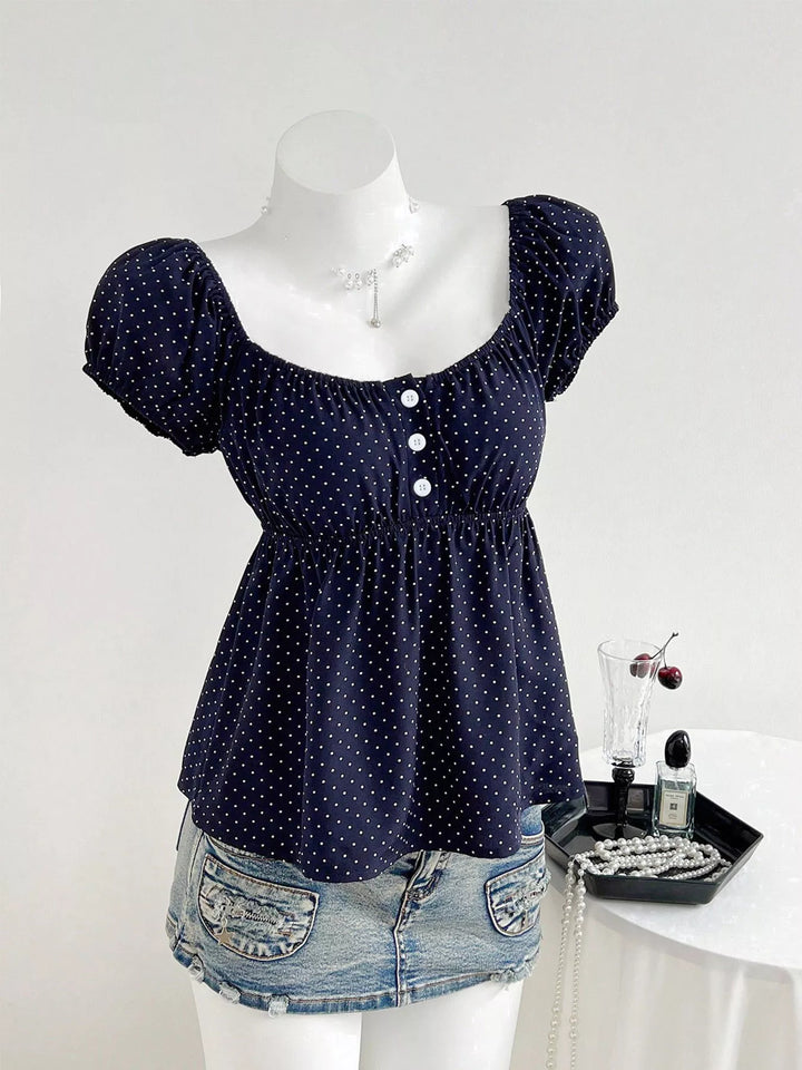 Polka dot scoop-neck peplum blouse with puff sleeves