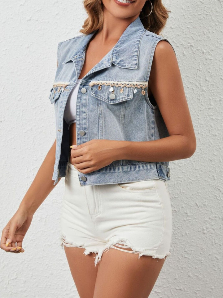 Sleeveless denim vest with shell and coin trim