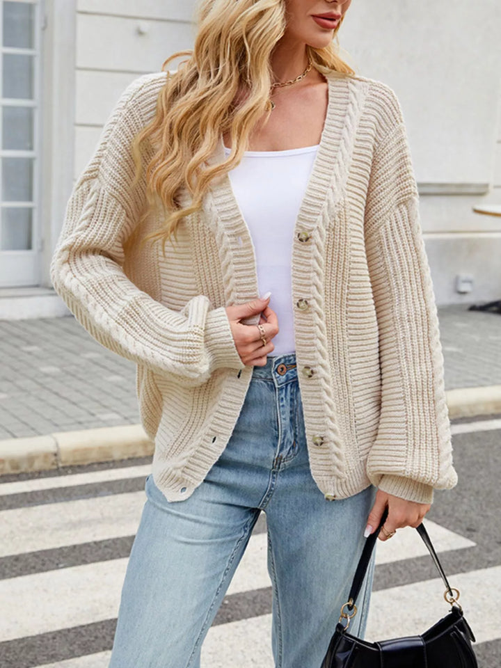 Cable knit button-front cardigan with drop shoulder sleeves