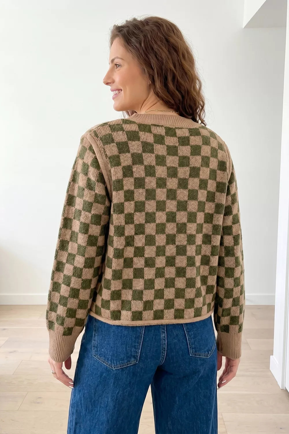 Checkerboard knit drop shoulder crew neck sweater