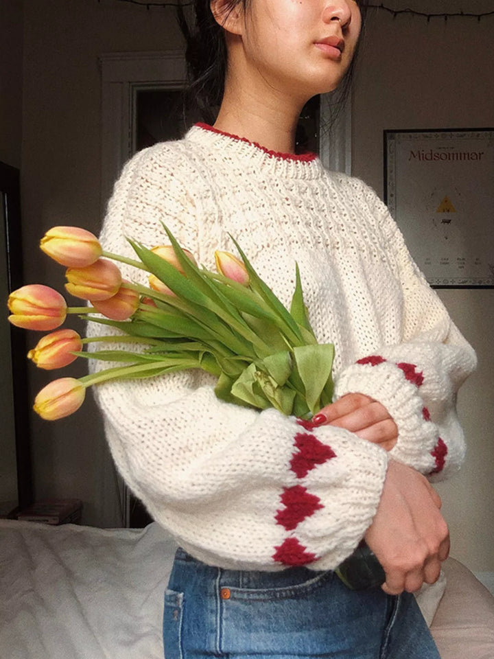 Chunky knit sweater with heart cuffs and contrast trim