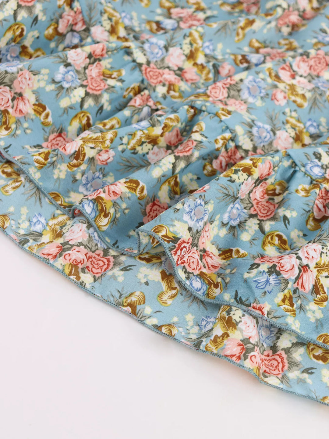 Floral halter mini dress with plunge neck and tie back