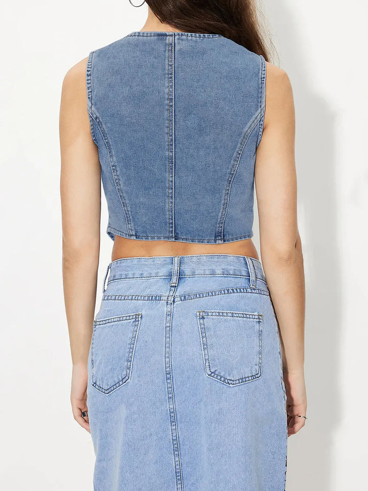 Fitted V-neck button-up denim vest with pointed hem