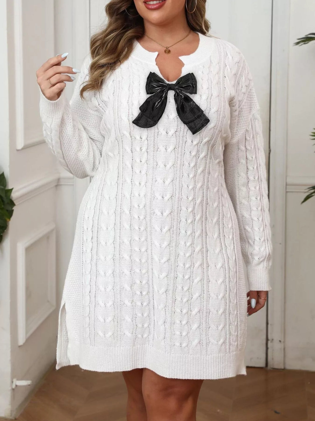 White Cable knit sweater dress with contrast bow and side slits