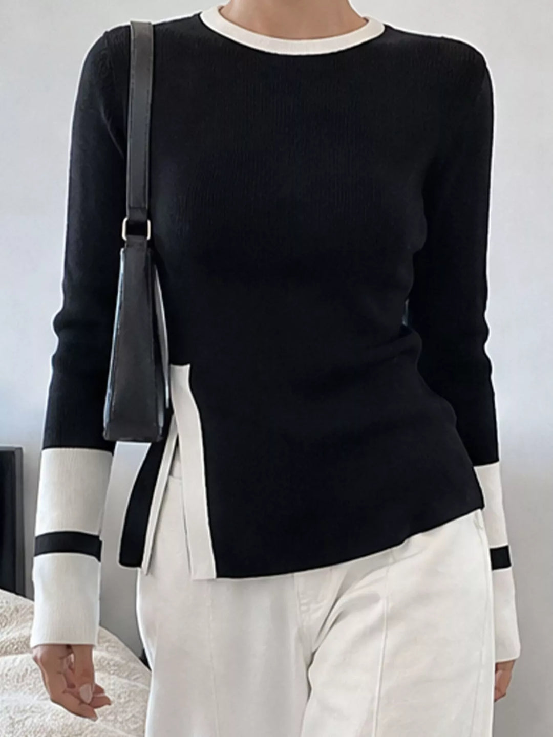 Ribbed knit side slit sweater with contrast trim