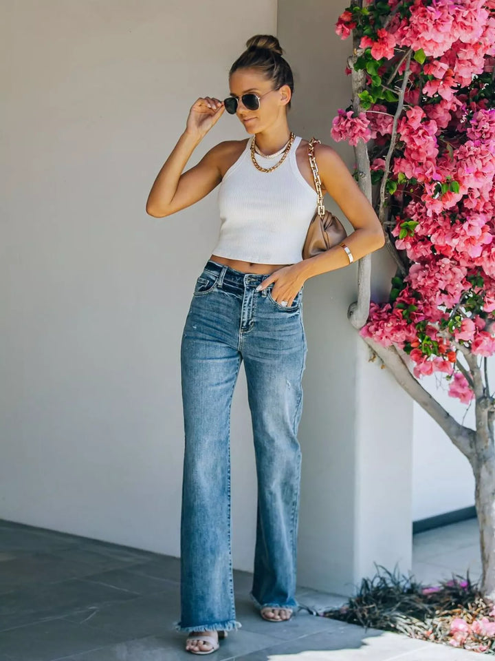High-rise wide leg jeans with raw frayed hem