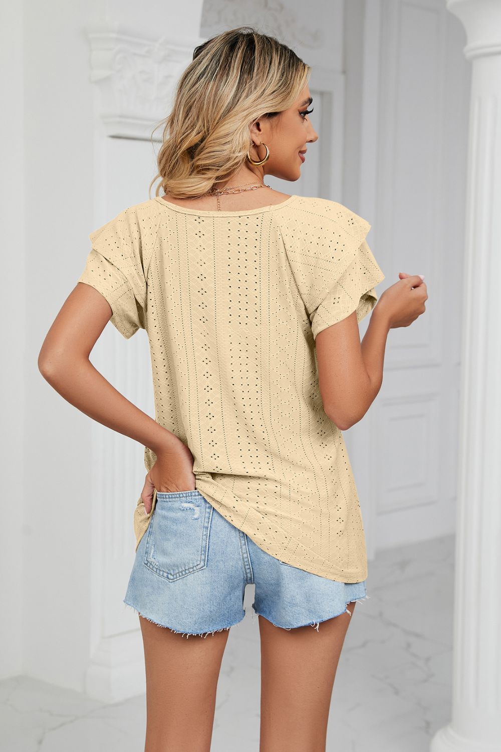 Eyelet knit V-neck top with layered flutter sleeves