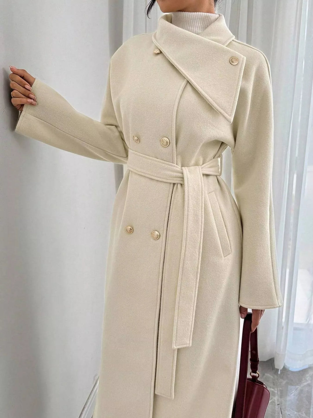 Double-breasted belted longline coat with stand collar