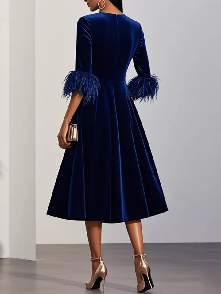 Feather cuff velvet midi dress with full A-line skirt
