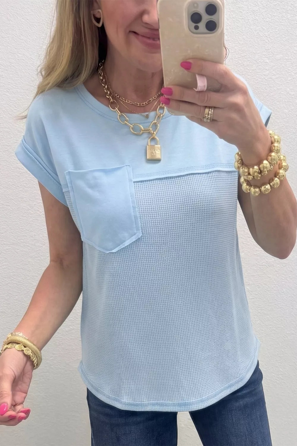 Waffle knit pocket tee with cuffed short sleeves
