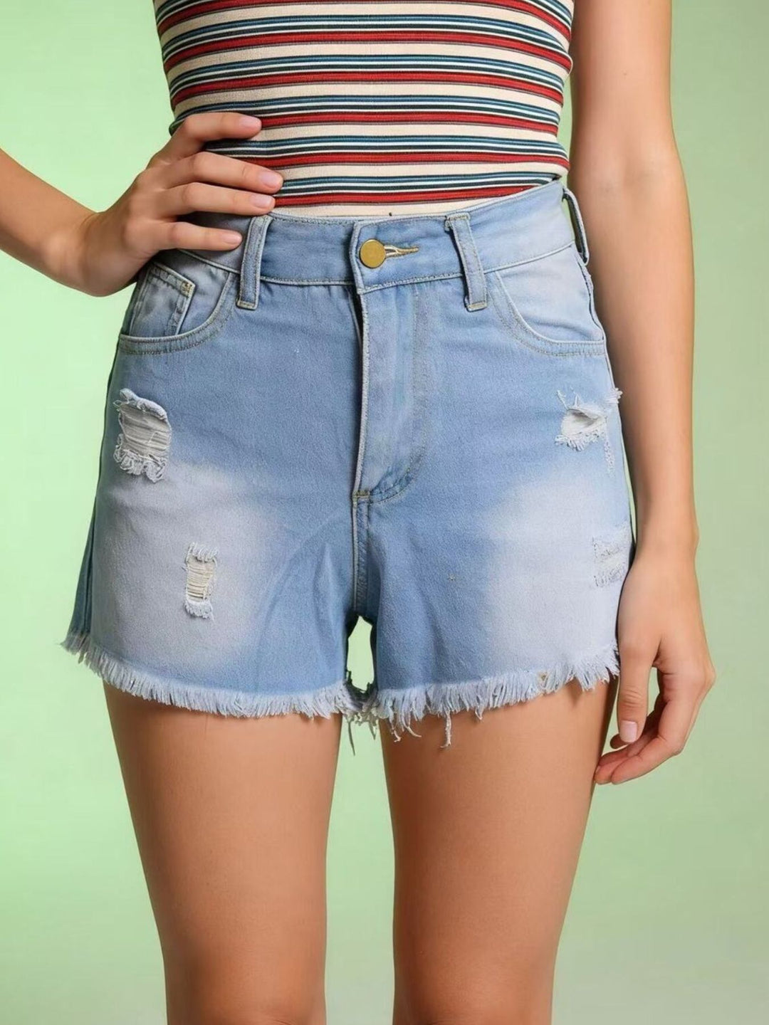 Distressed high-rise denim shorts with frayed raw hem