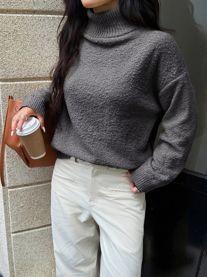 Textured knit turtleneck sweater with drop shoulders