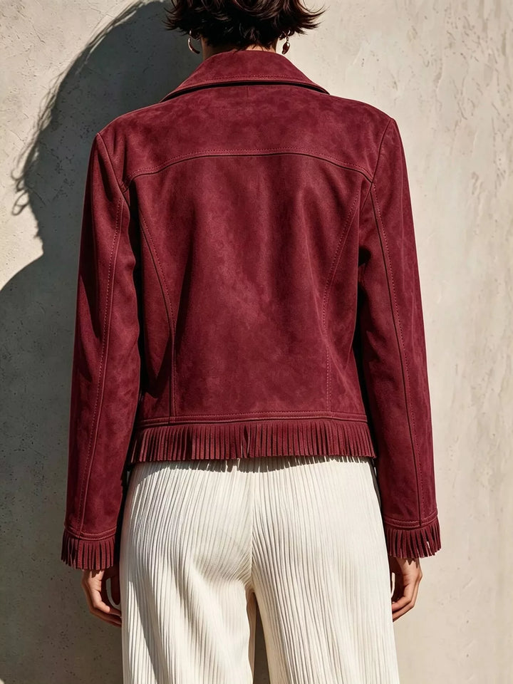 Fringe hem faux leather moto jacket with asymmetrical zip