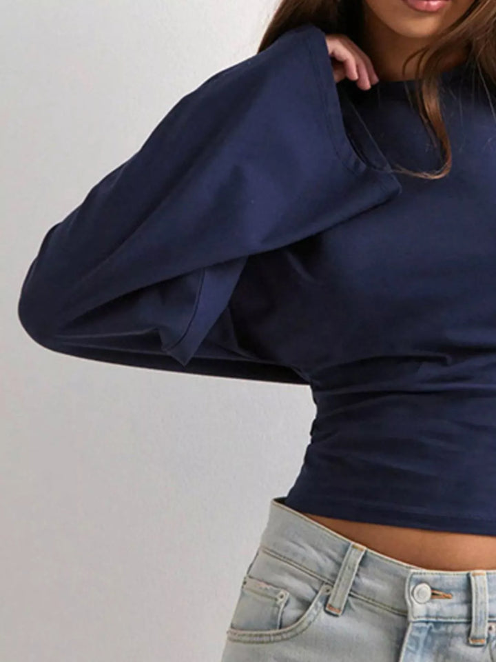 Fitted long sleeve top with flared bell sleeves