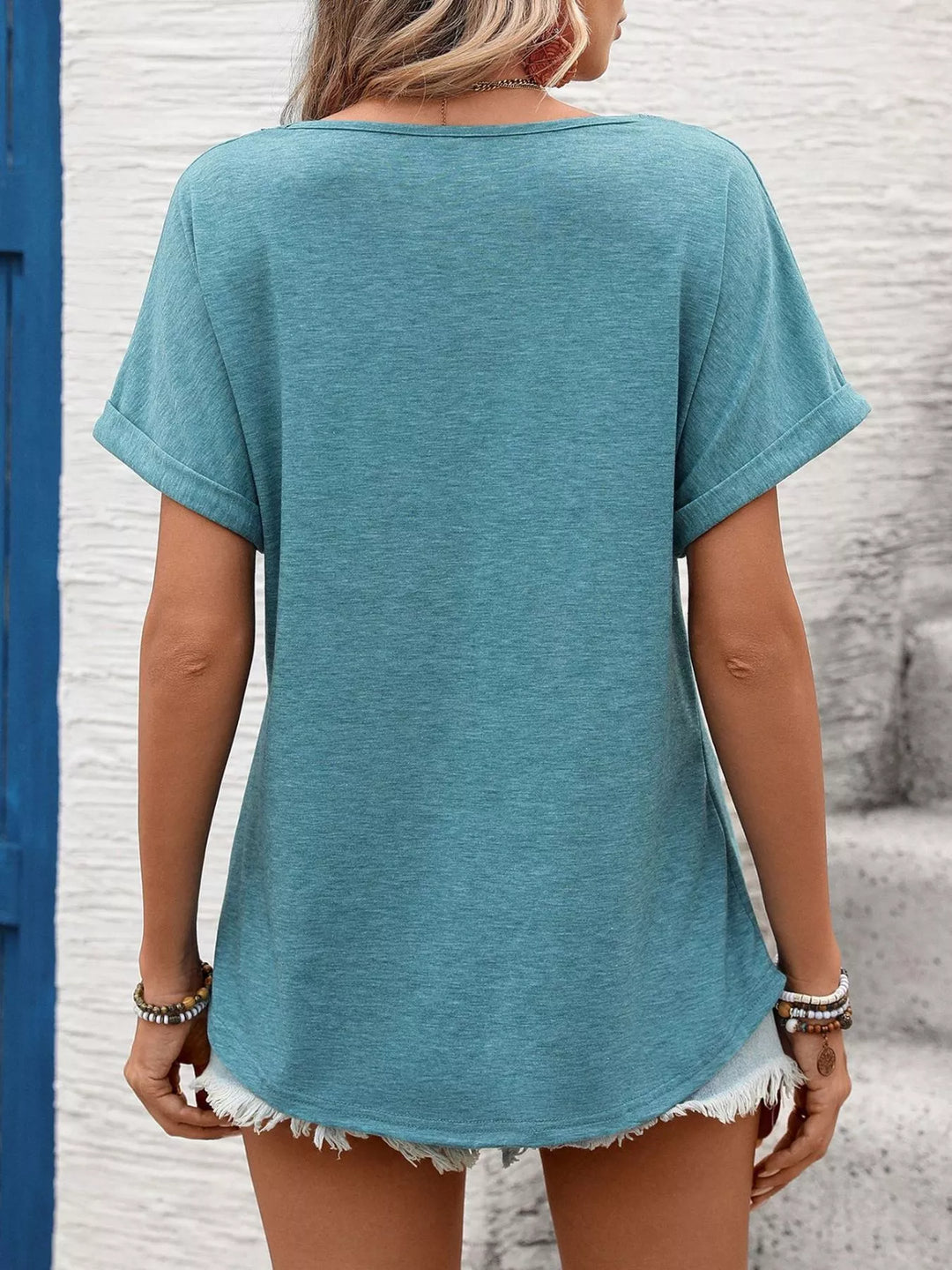 Lace-trim V-neck short sleeve top with rolled cuffs