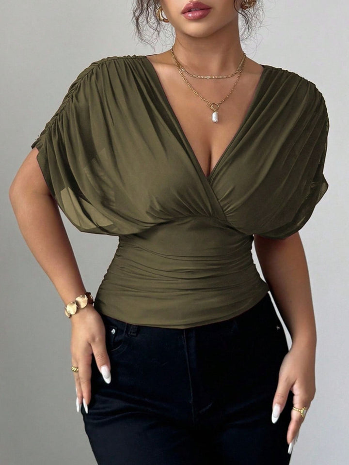 Ruched surplice wrap top with short dolman sleeves