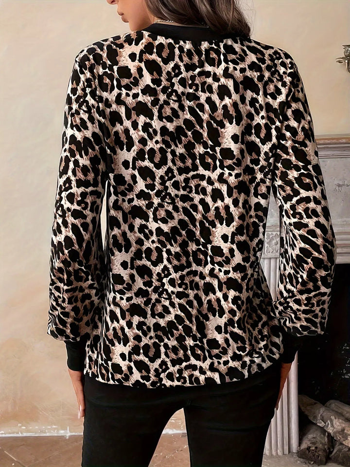 Leopard print V-neck long sleeve top with button cuffs