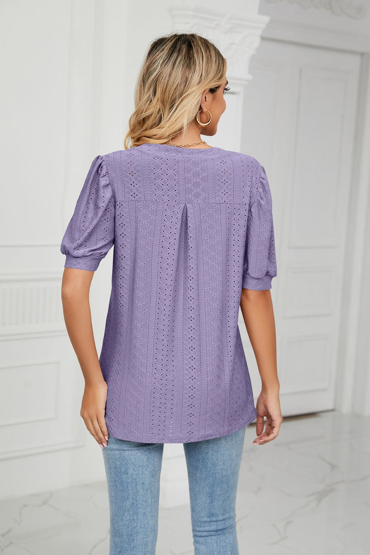 Eyelet puff sleeve top with notched V-neck
