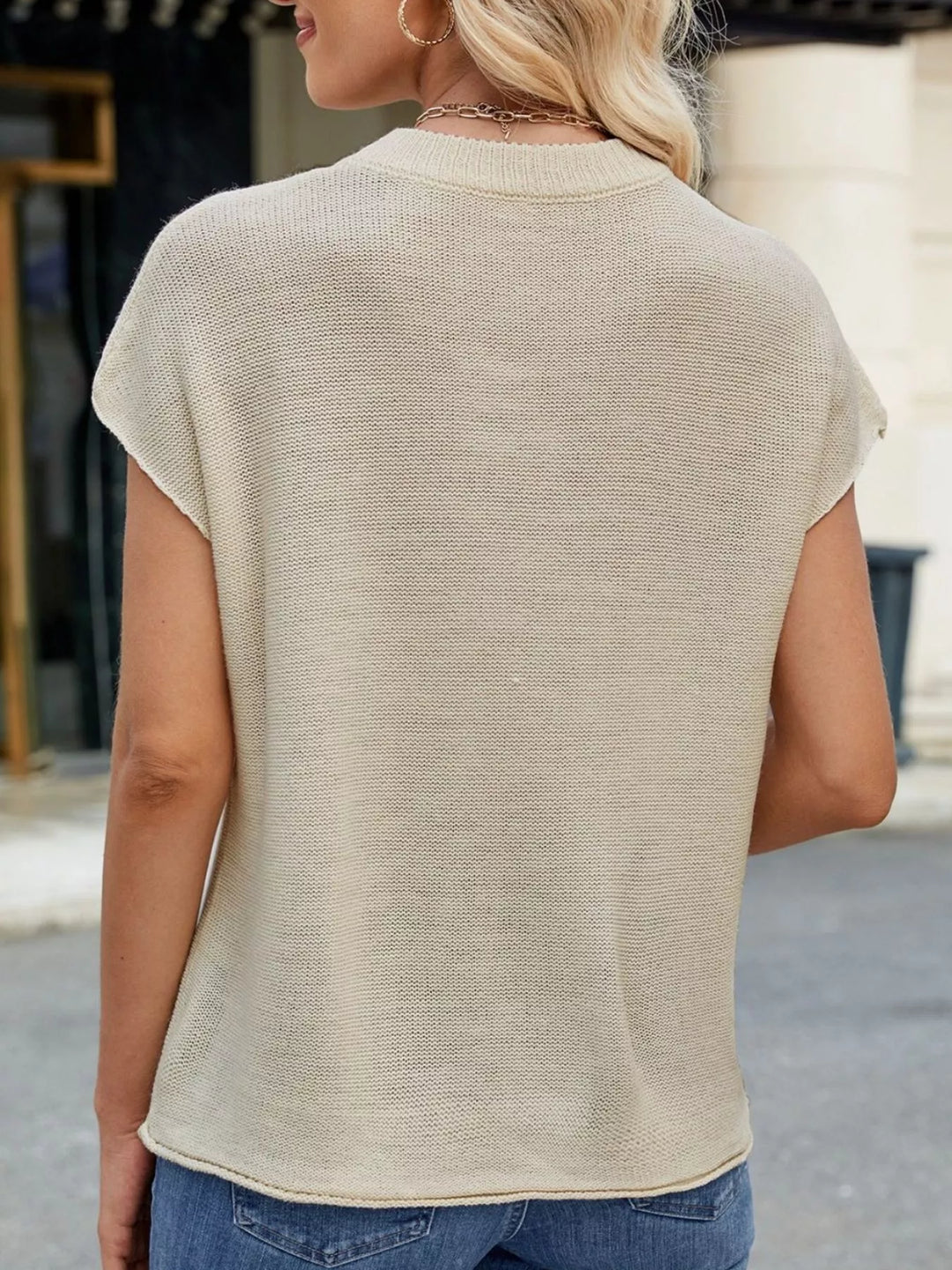 Short sleeve knit top with center seam and ribbed neck