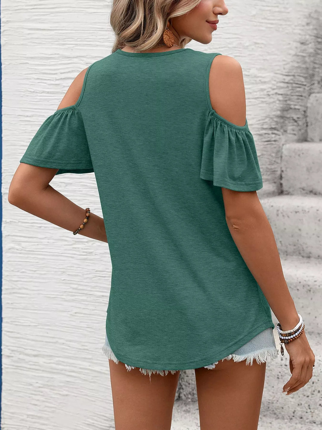 Cold shoulder V-neck top with ruched chest and ruffle sleeves