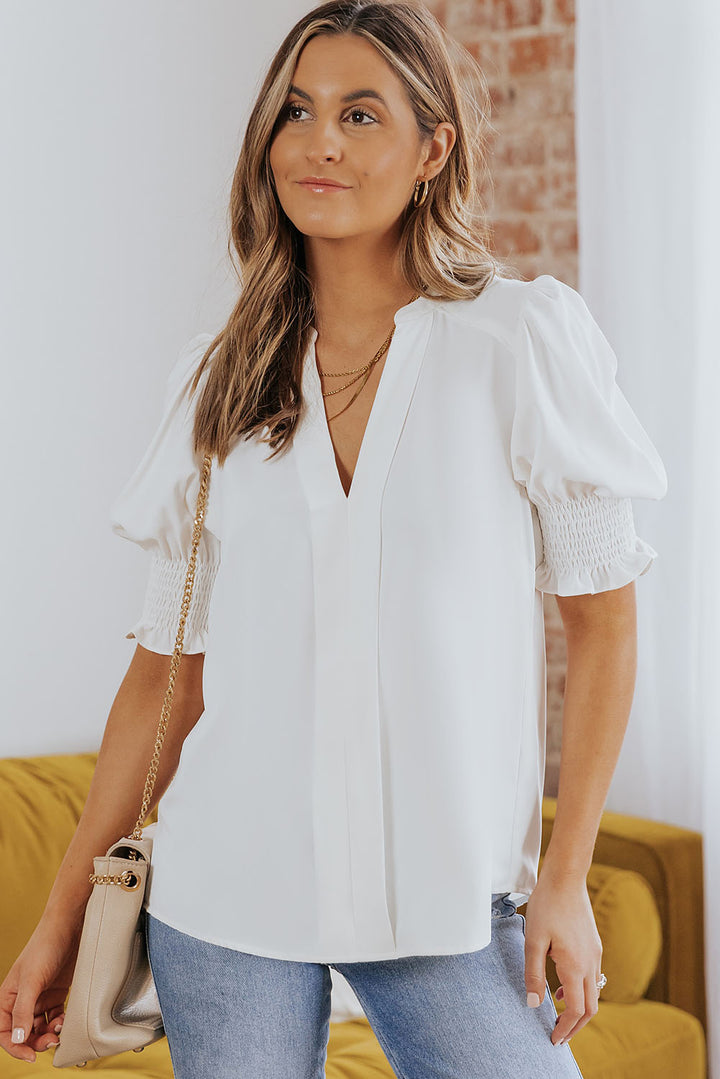 White Notched neck blouse with smocked flounce sleeves
