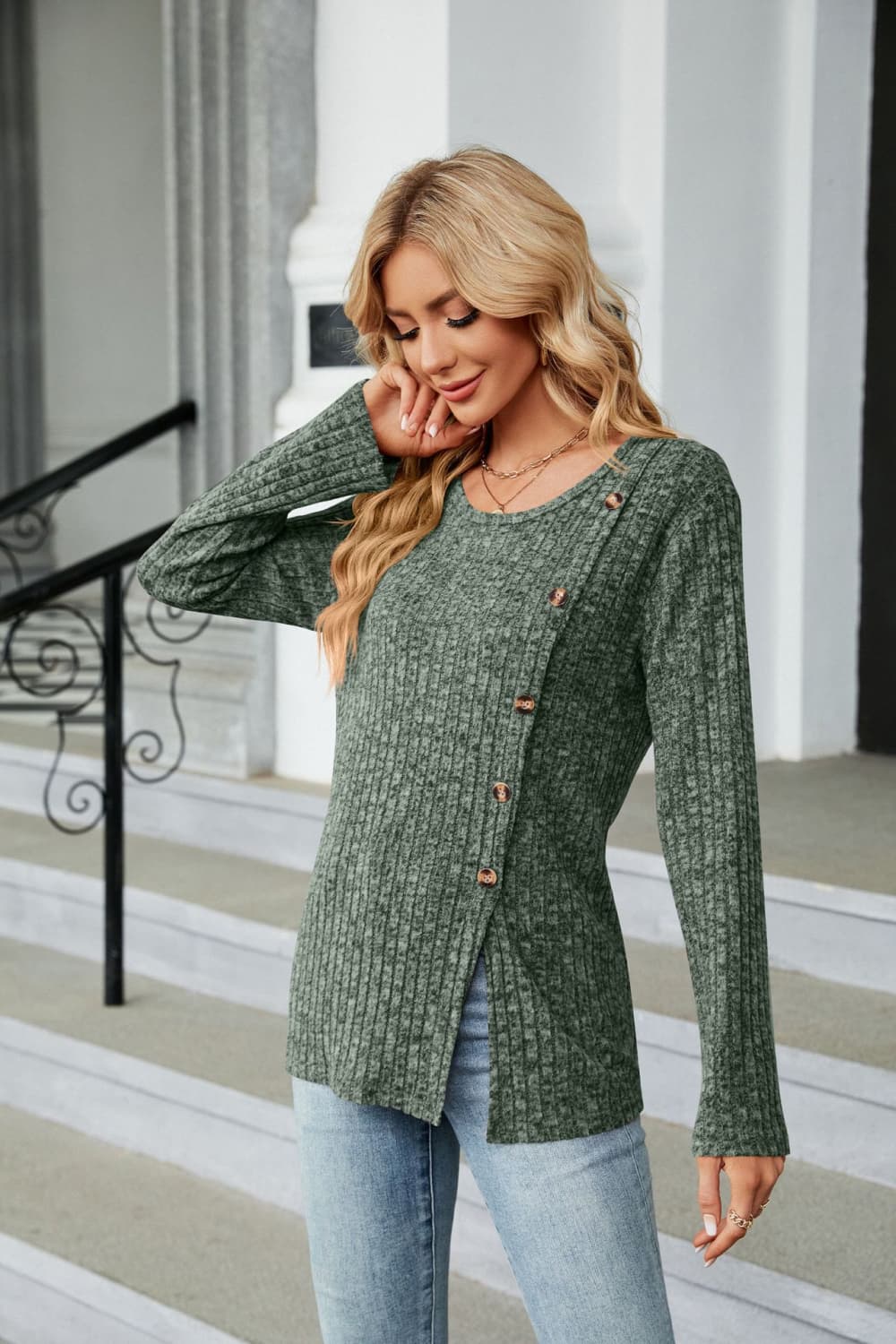 Ribbed knit long sleeve top with side buttons and slit hem